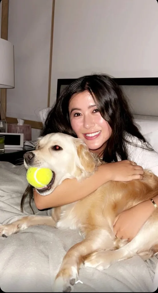Amanda with her mini golden retriever Paisley